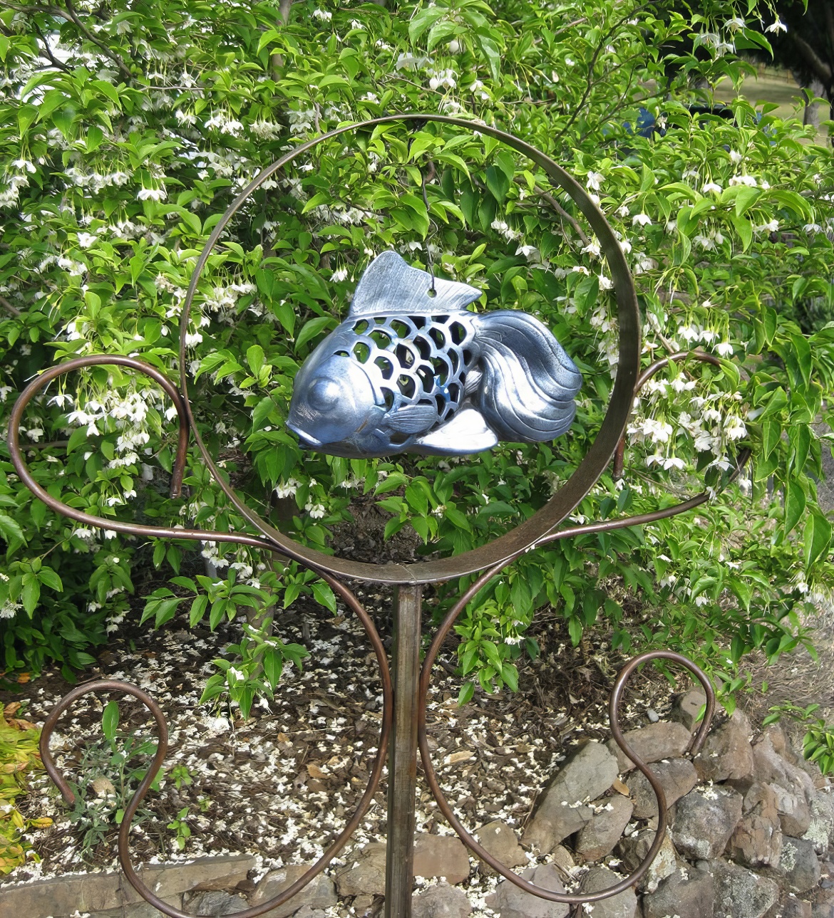 Fish Jumps Hoop in Garden